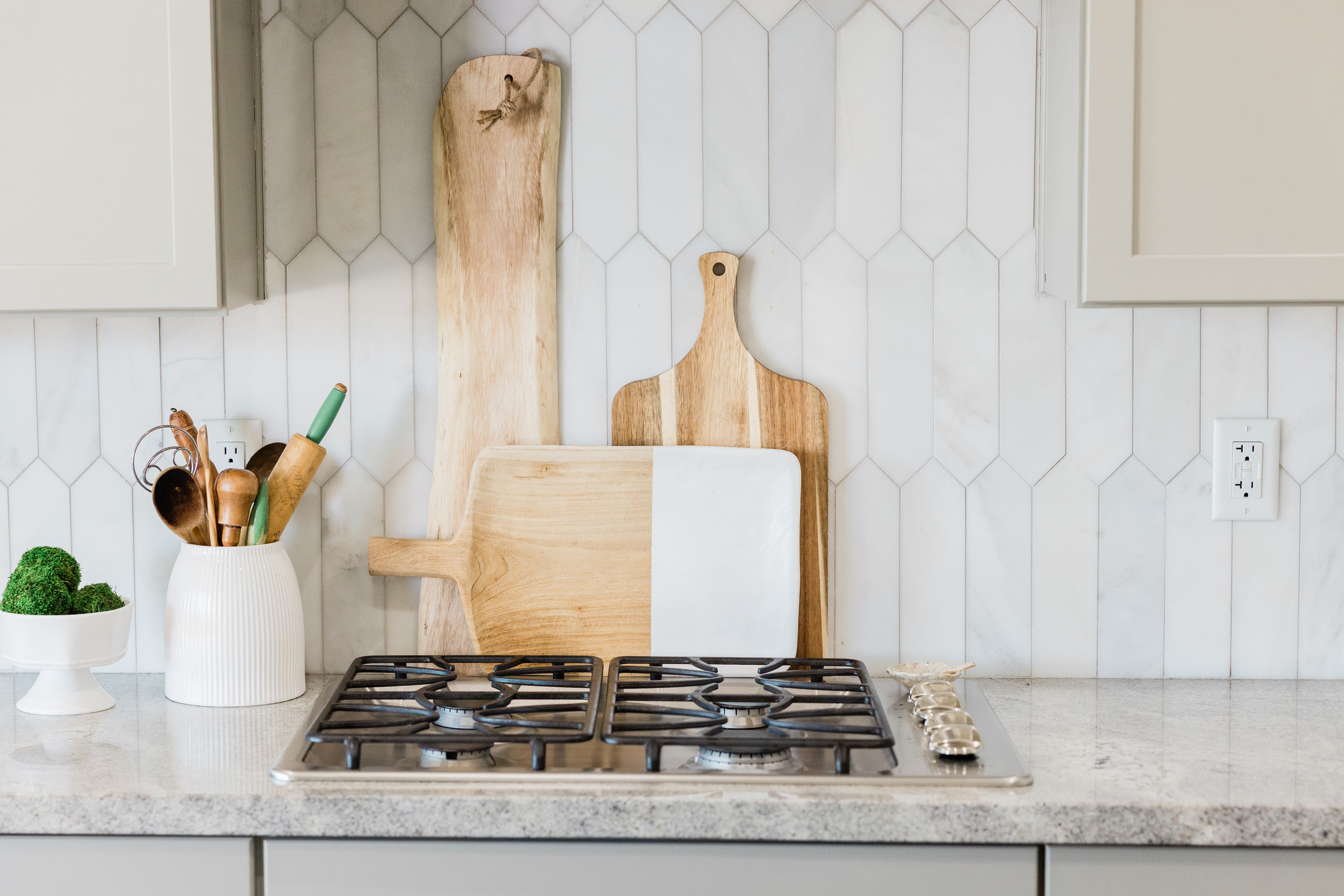 Stove and Wooden Cutting Board in the Kitchen