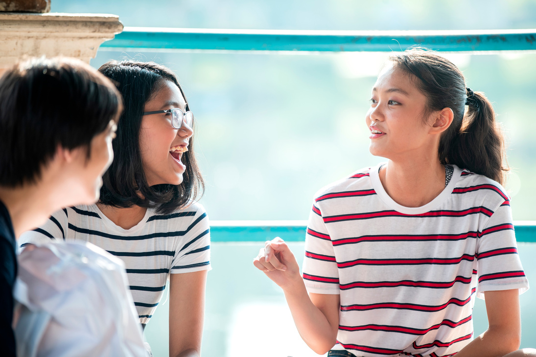 Happy conversation amongst friends.